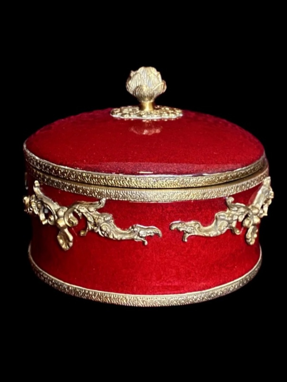 vintage porcelain trinket box with an ornate brass rim